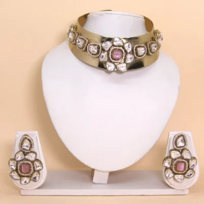 Premium gift-ready box containing Kundan Hasli Choker necklace set with pink gemstone and earrings