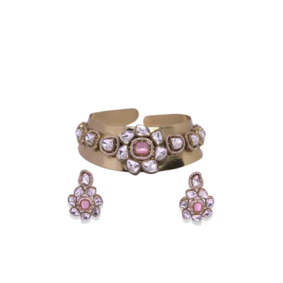 Gold finish Hasli choker with mirror-cut Kundan stones and pink center gemstone handcrafted in India