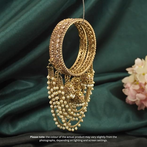 Kundan-style bridal bangle set with hanging jhumka details