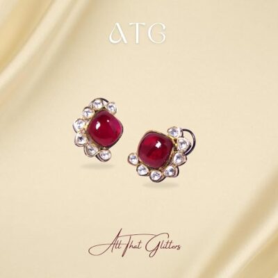 Red Kundan-style stud earrings for women with sparkling stone detailing